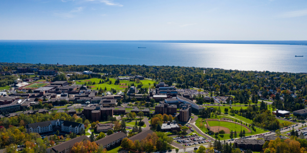 Aerial view of UMD campus, Duluth, and Lake Superior